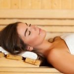 Woman Sleeping in Sauna